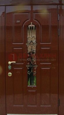 Красивая металлическая дверь со стеклом и ковкой ДСК-33 в Нижнем Новгороде